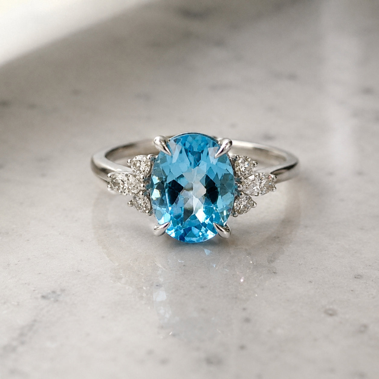 White Gold Oval Blue Topaz & Diamond Ring