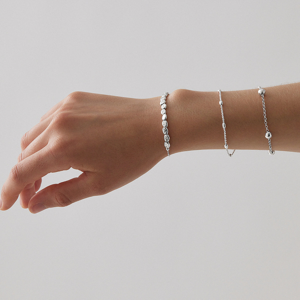 The Cluster Of Textured Rectangular ‘Stars’ Is Held In Place By Fixed Round Beads And Threaded Onto An Elegant Link Chain With An Adjustable Sliding Ball Fastener.