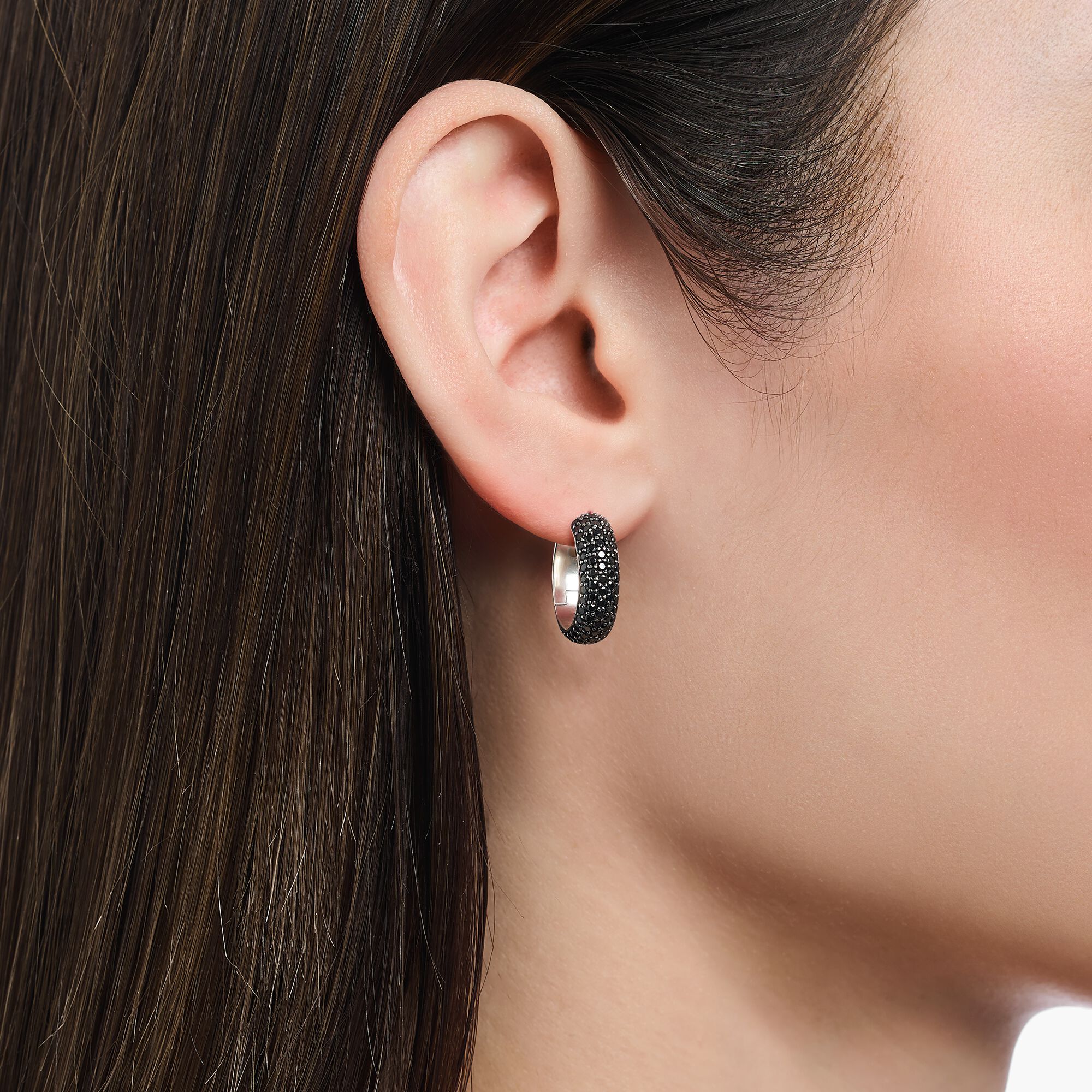 Small, wide hoop earrings with black zirconia