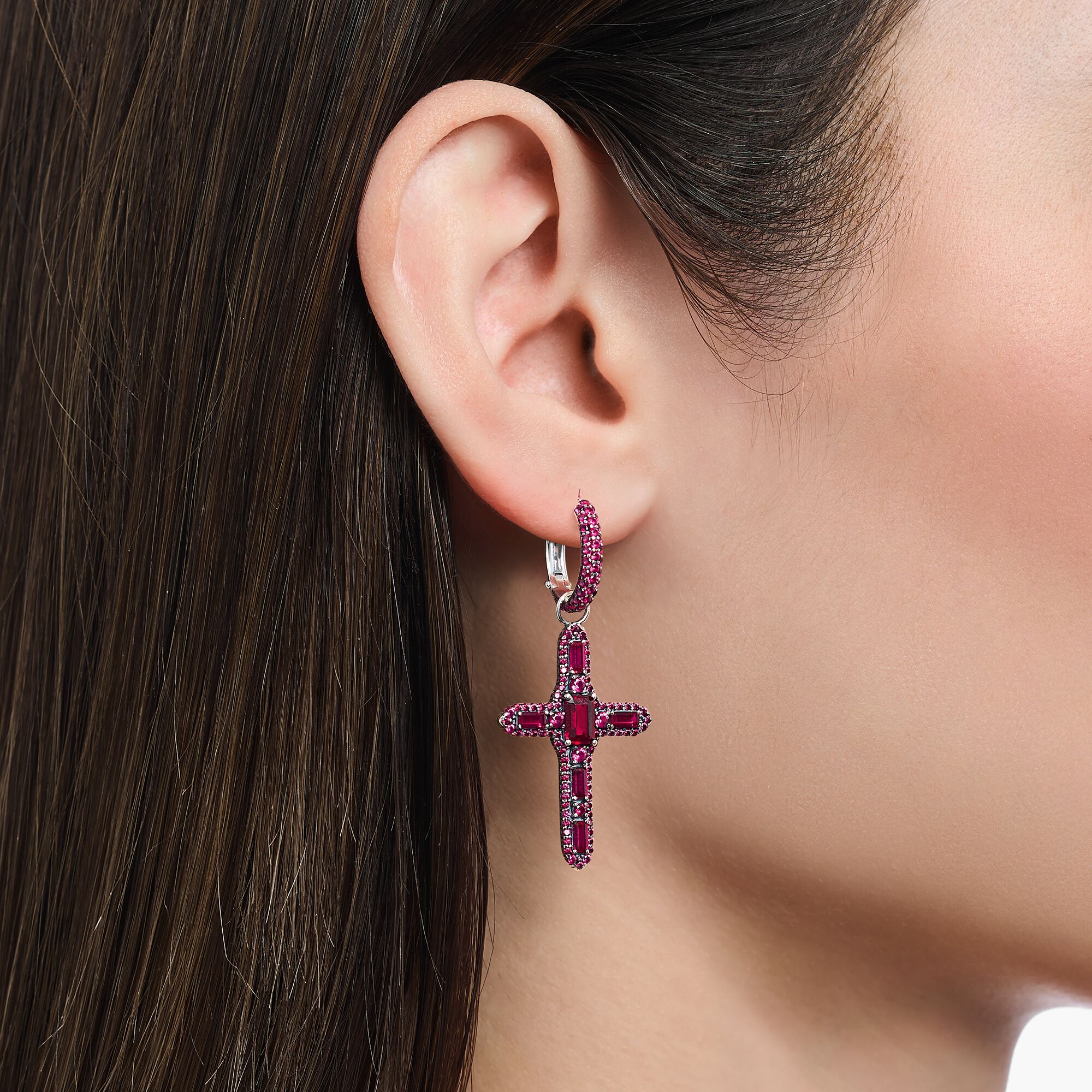 Single Cross hoop earring with ruby red stones